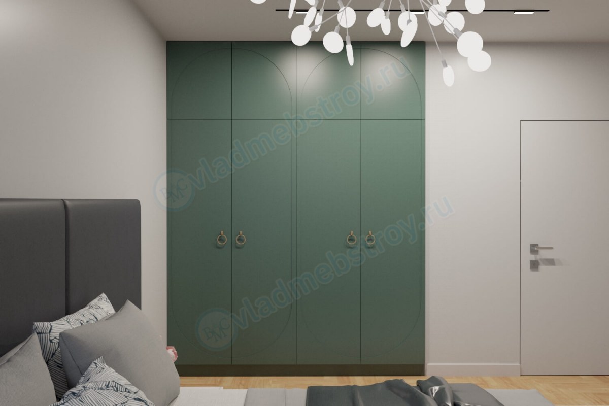 Шкаф темно-зеленого цвета встроенный в комнате