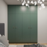 Шкаф темно-зеленого цвета встроенный в комнате 