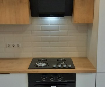 Кухня с встроенной техникой в Сновицах